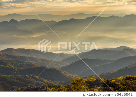 Layer of mountains and mist at sunset time 20436041