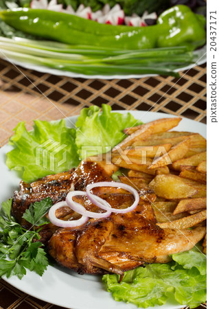 Tobacco chickens with fried potatoes. Tobacco chickens with fried potatoes. 20437171