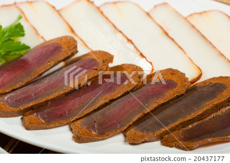 Cutted meat and lard on a plate Cutted meat and lard on a plate 20437177