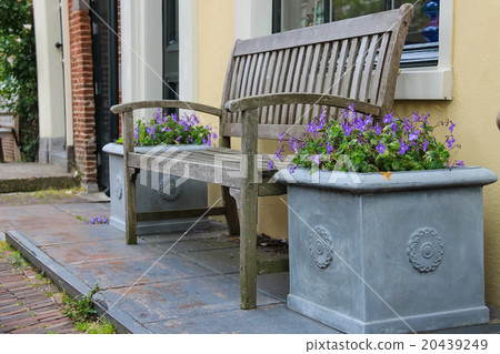 Traditional Dutch wooden bench surrounded  20439249