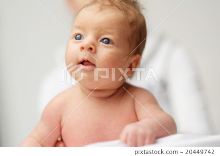 One month old newborn baby with mother One month old newborn baby with mother 20449742