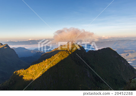 Layer of mountains and mist at sunrise time Layer of mountains and mist at sunrise time 20452288
