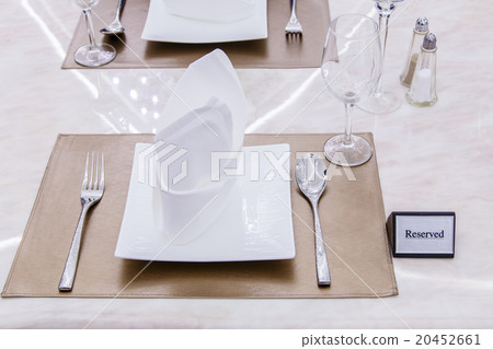 Reserved sign on a table in restaurant 20452661