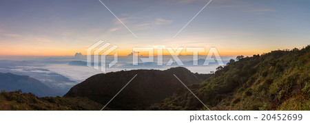 Layer of mountains and mist at sunset time Layer of mountains and mist at sunset time 20452699