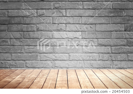 Blick brown wall background and wood shelf. 20454503