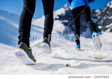 Legs of two runners 20455665