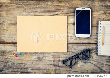 Desktop mix on a wooden office table. 20456743