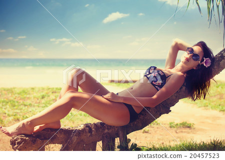 woman in a bikini woman in a bikini 20457523