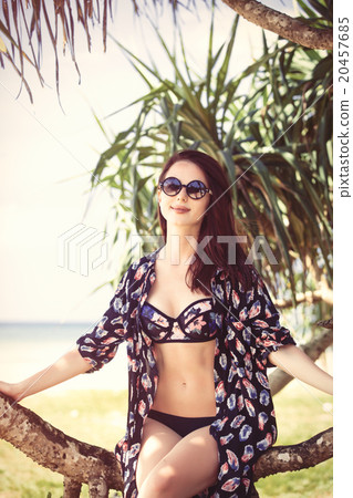 woman in a bikini woman in a bikini 20457685