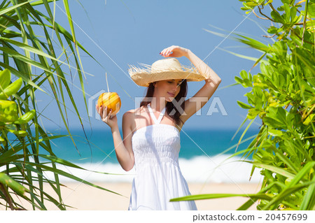 woman with coconut cocktail woman with coconut cocktail 20457699