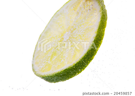 lime slice falling or dipping in water lime slice falling or dipping in water 20459857