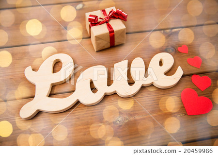 close up of word love with gift box and red hearts close up of word love with gift box and red hearts 20459986