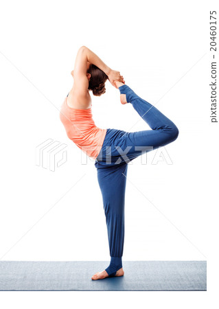 Woman doing yoga asana Natarajasana 20460175