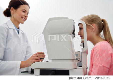 optician with tonometer and patient at eye clinic 20460950