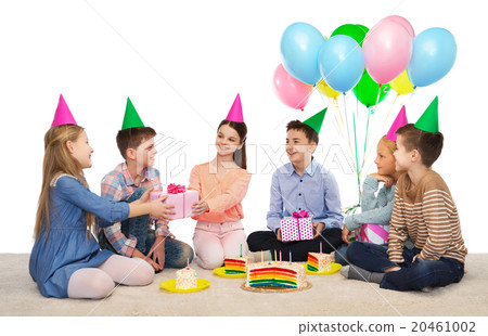 happy children giving presents at birthday party 20461002