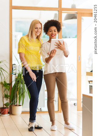 happy creative team with tablet pc in office happy creative team with tablet pc in office 20461255
