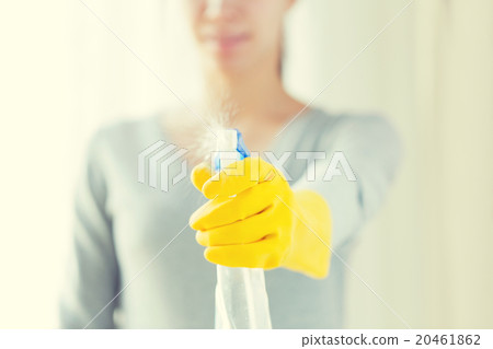 close up of happy woman with cleanser spraying close up of happy woman with cleanser spraying 20461862