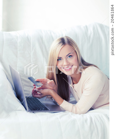 businesswoman with laptop and credit card businesswoman with laptop and credit card 20461864