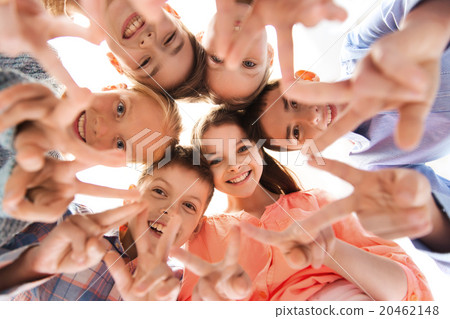 happy children showing peace hand sign 20462148