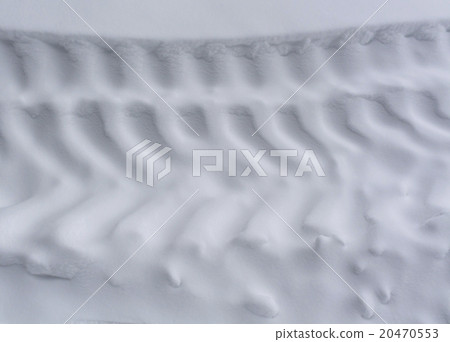 Tire tracks on snow. 20470553