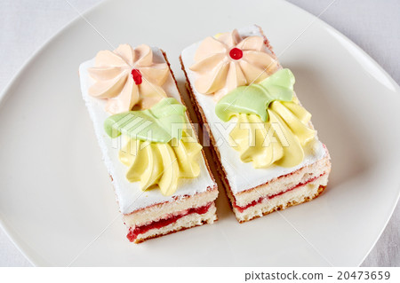two cakes on a plate two cakes on a plate 20473659