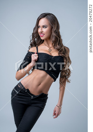 Gorgeous brunette advertises fancy clothes 20478272