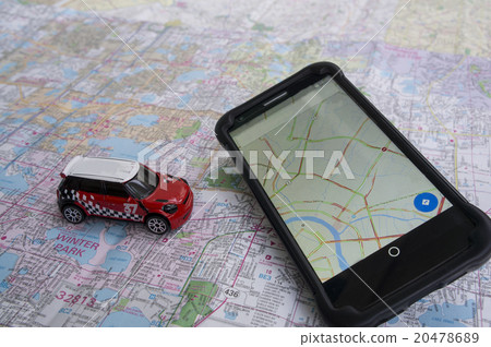 toy car on map with phone 20478689
