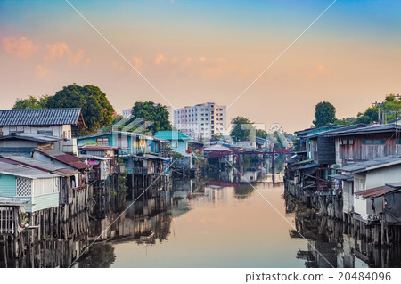 slum at waterside in sunrise morning slum at waterside in sunrise morning 20484096