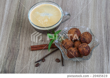 Coffee with chocolate balls Coffee with chocolate balls 20485619