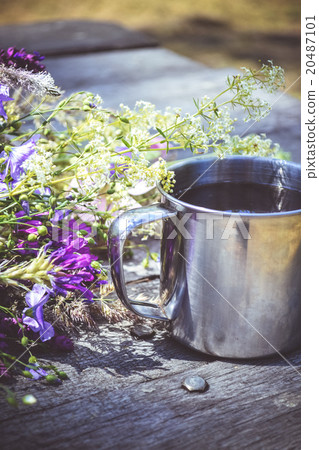 hiking mug on a wooden table hiking mug on a wooden table 20487101