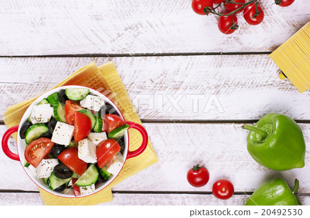 Greek salad in red boul Greek salad in red boul 20492530