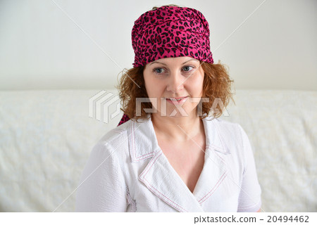 Portrait of woman with  scarf on her head like a 20494462
