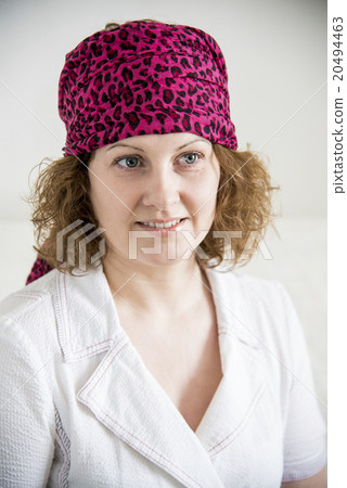 Portrait of woman with  scarf on her head like a 20494463