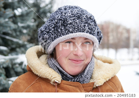 Woman portrait at winter season with snowy fir trees Woman portrait at winter season with snowy fir trees 20495183