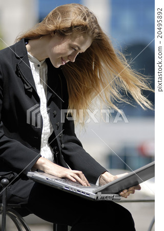 young undergraduate with laptop 20495892