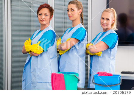 Cleaning brigade working in office Cleaning brigade working in office 20506179