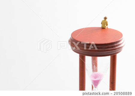 Hourglass and doll 20508889