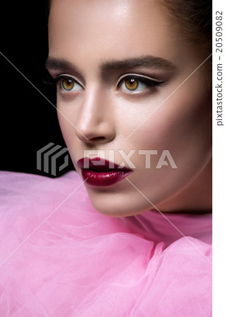 Beautiful girl in pink lace collar 20509082