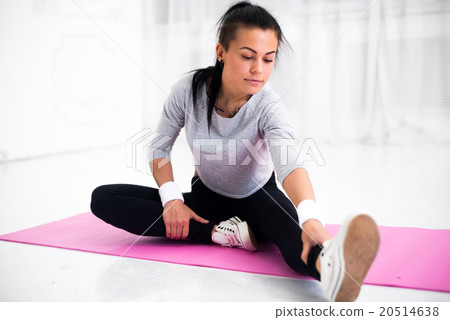 Fit woman doing aerobics gymnastics stretching Fit woman doing aerobics gymnastics stretching 20514638