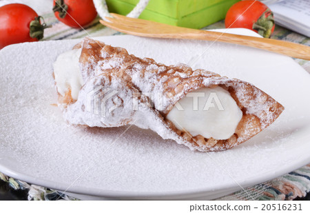Cannoli on a white plate  20516231