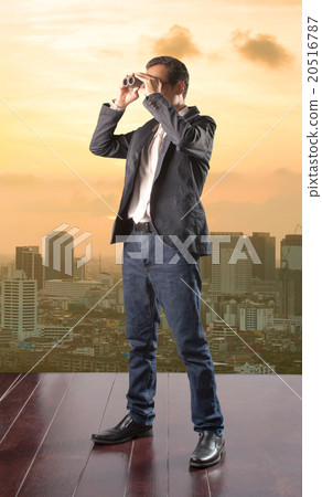 business man looking to future opportunity by binocular and usin 20516787