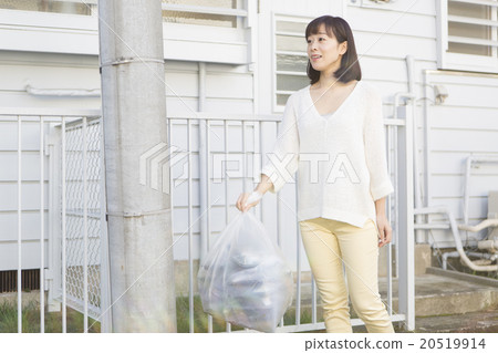 A woman who puts out garbage 20519914