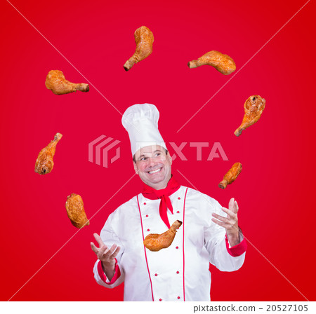 cheerful cook juggles with chicken thighs cheerful cook juggles with chicken thighs 20527105