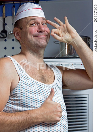 cook in the kitchen showing perfect gesture cook in the kitchen showing perfect gesture 20527106