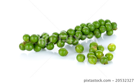 Green peppercorns isolated on the white background Green peppercorns isolated on the white background 20532327