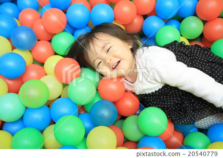 Baby playing with ball pool (1 year old child) Baby playing with ball pool (1 year old child) 20540779