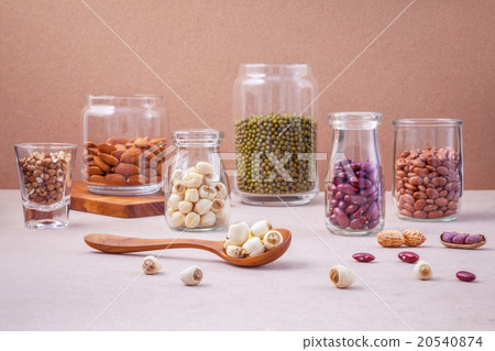 Various beans and nuts in the glass jars. Various beans and nuts in the glass jars. 20540874