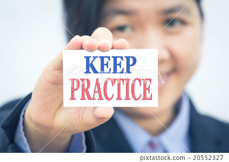 Businesswoman holding card with business message. 20552327