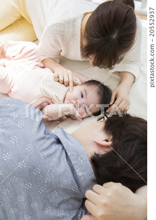 Baby and mother sleeping and dad Baby and mother sleeping and dad 20552937