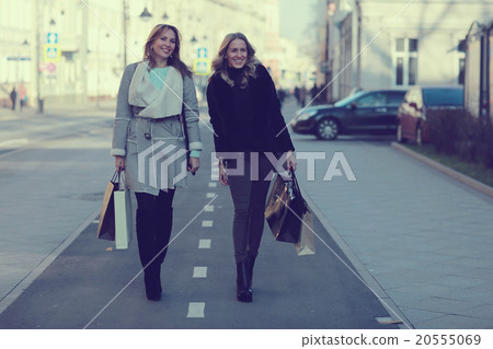 Portrait of pensive girl in town 20555069